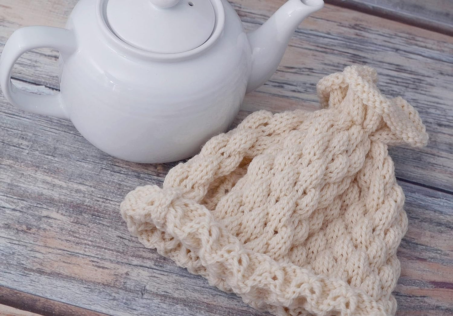 Ivory knitted teapot cozy