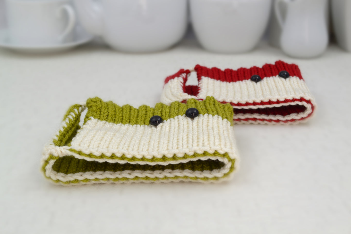 Knitted Mug Cozies with black eyes, Set of 2. Christmas gift.