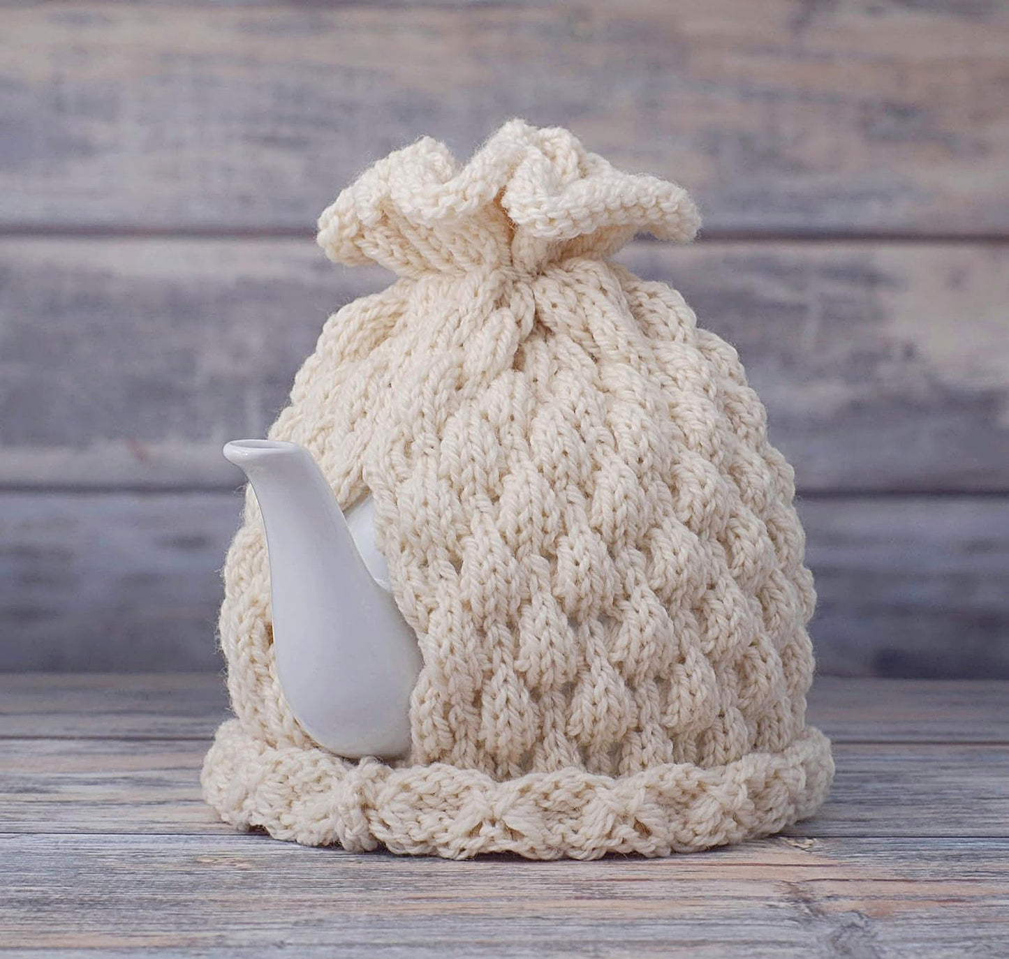 Ivory knitted teapot cozy