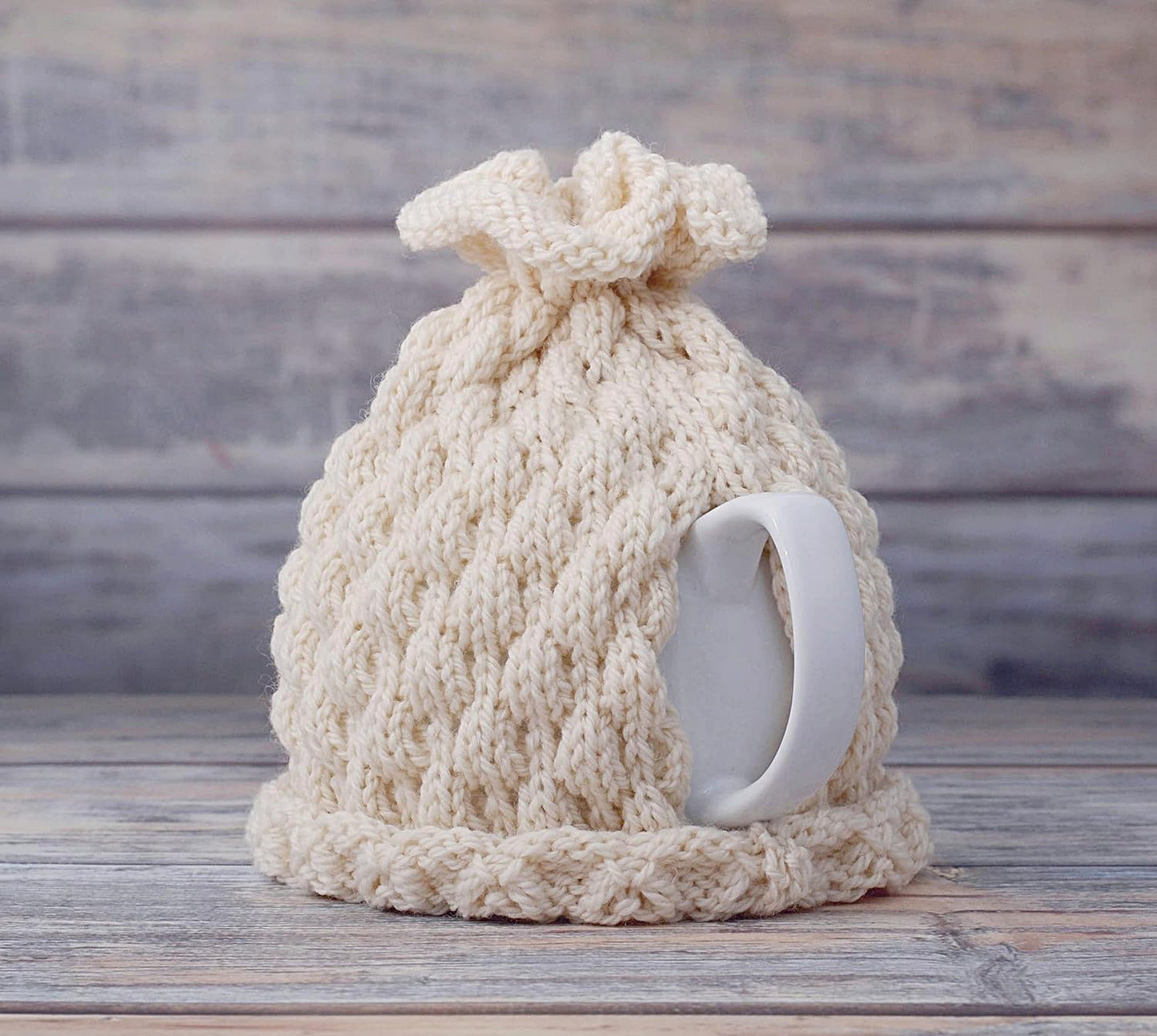 Ivory knitted teapot cozy