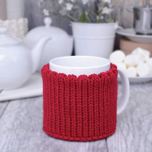 Red knitted mug cozy