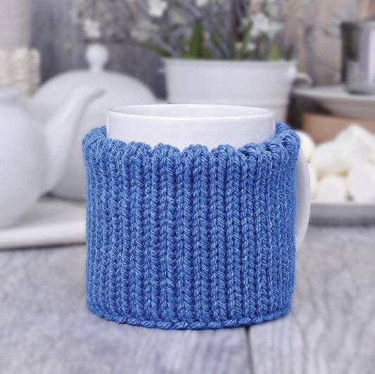 Blue knitted mug cozy