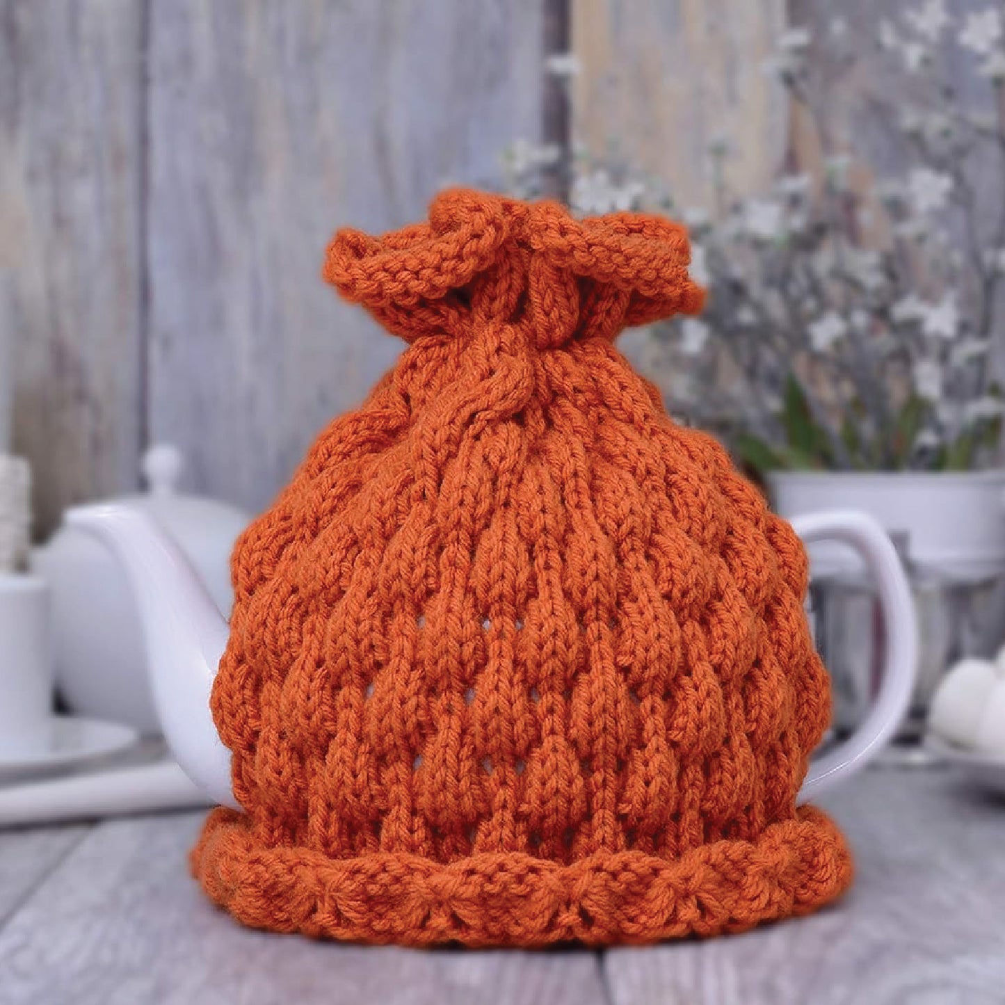 Pumpkin knitted teapot cozy