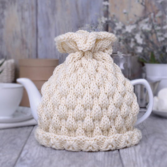 Ivory knitted teapot cozy