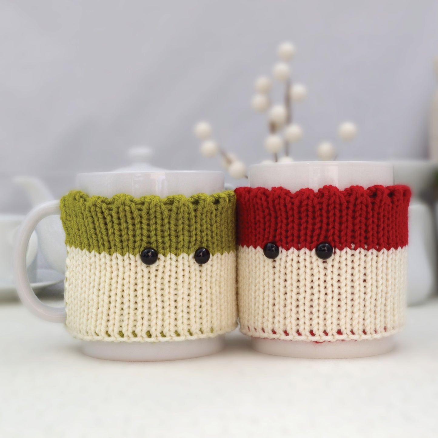 Knitted Mug Cozies with black eyes, Set of 2. Christmas gift.