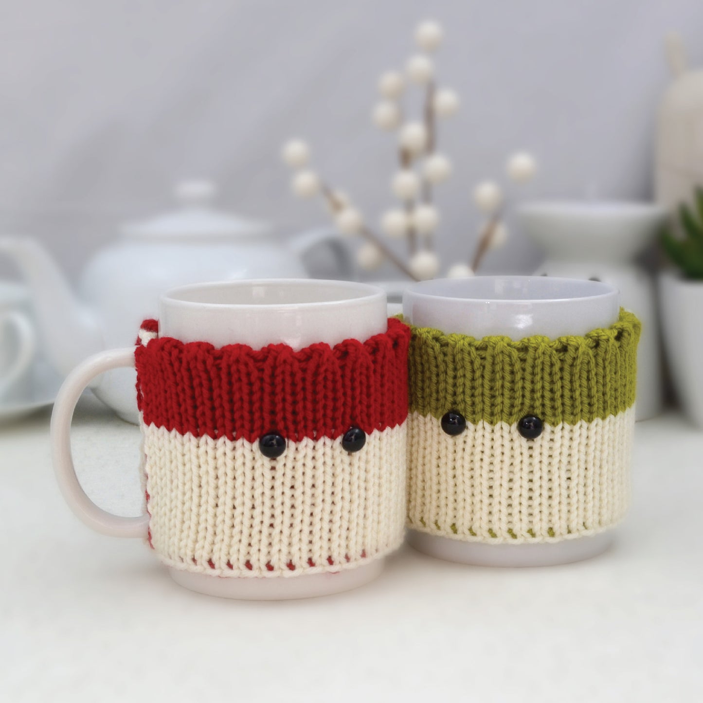 Knitted Mug Cozies with black eyes, Set of 2. Christmas gift.