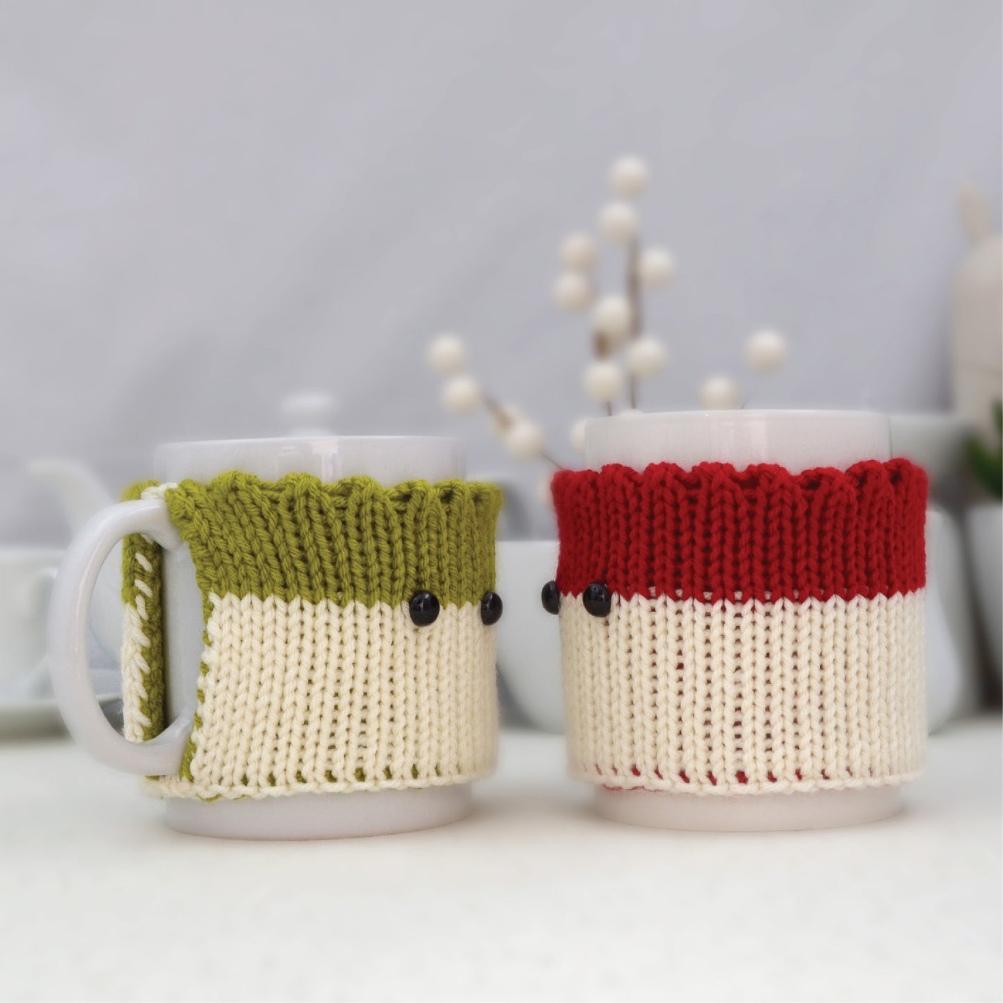 Knitted Mug Cozies with black eyes, Set of 2. Christmas gift.