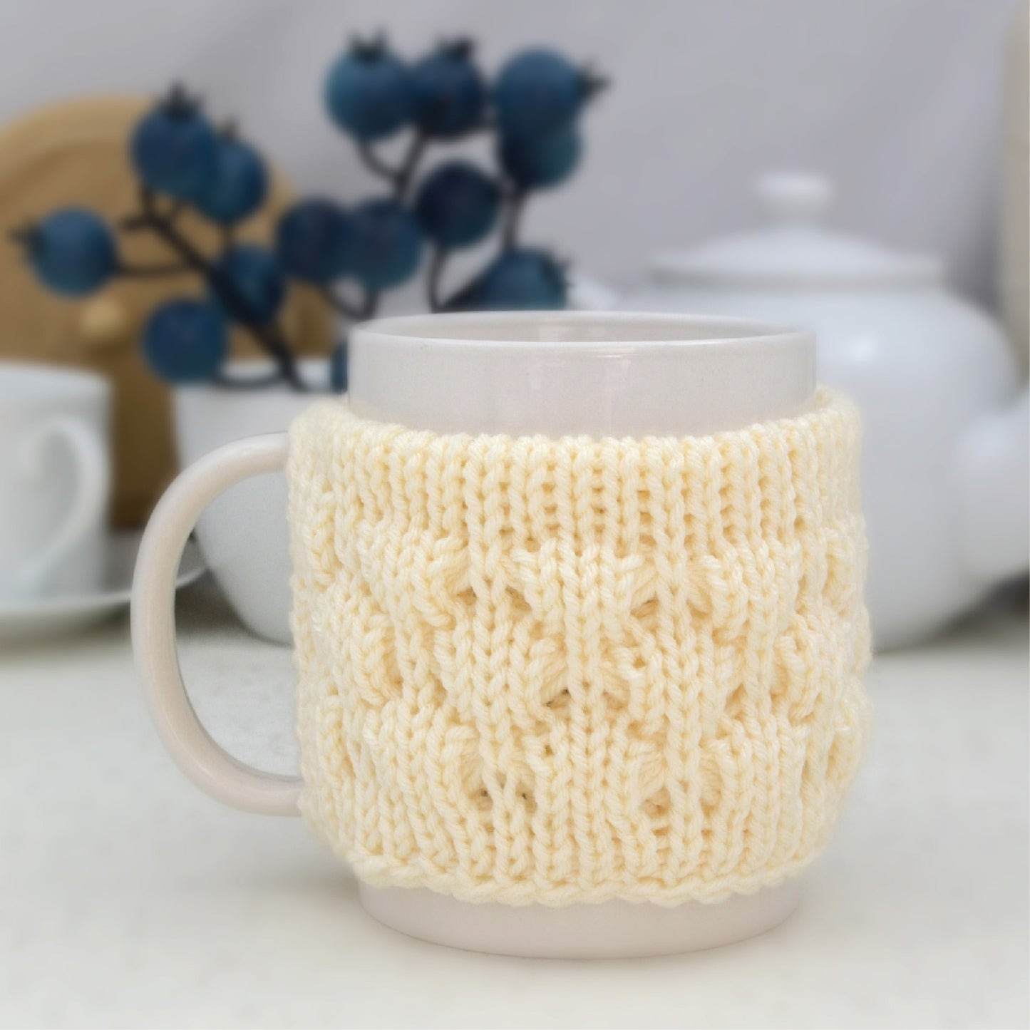 Knitted mug cozy.