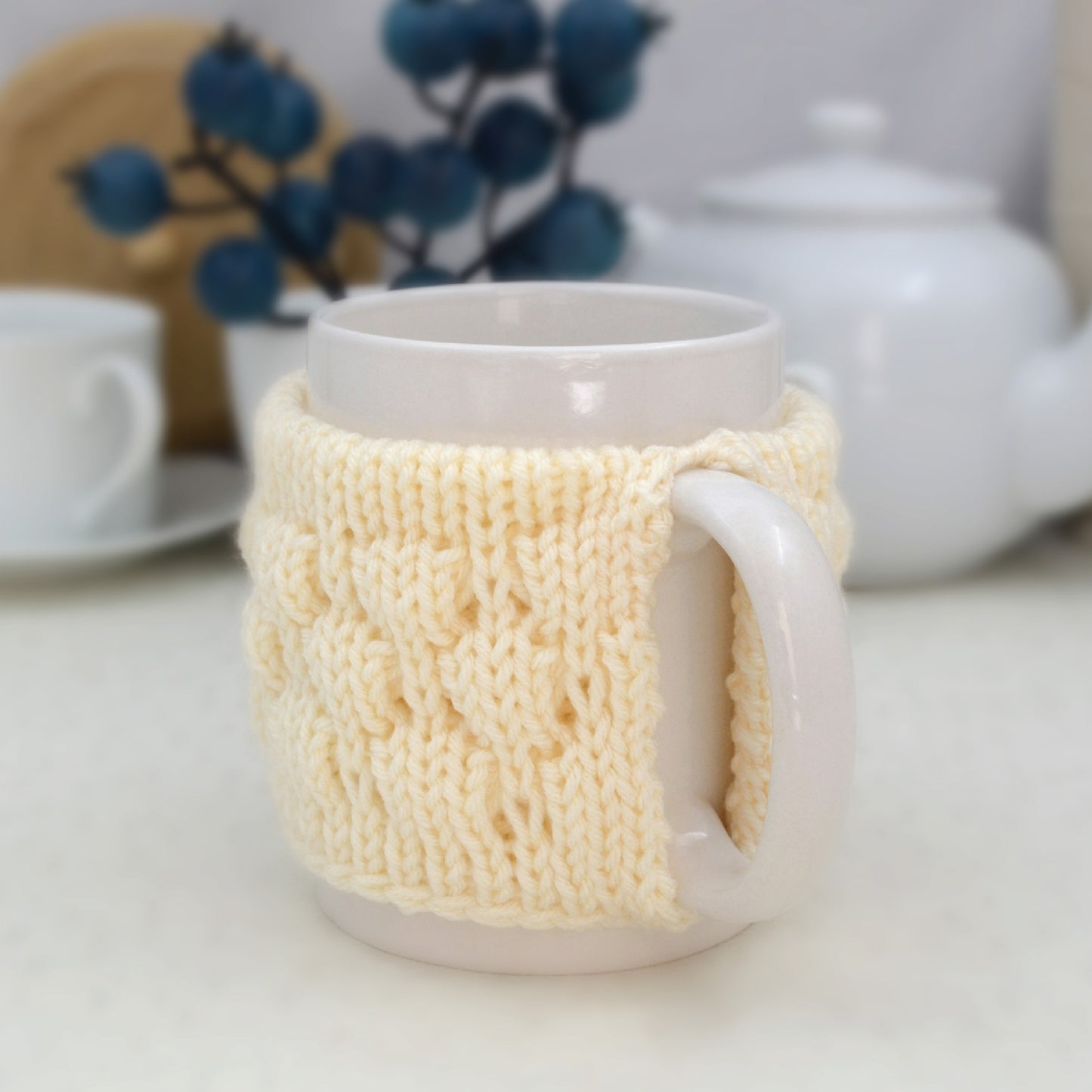 Knitted mug cozy.