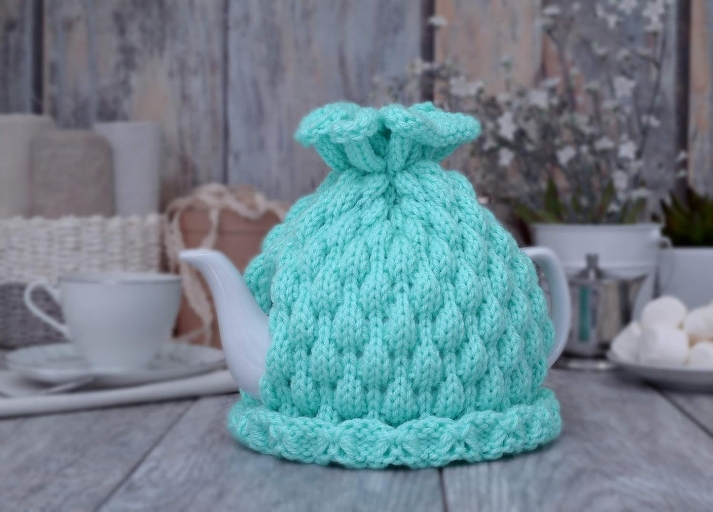 Aqua knitted teapot cozy