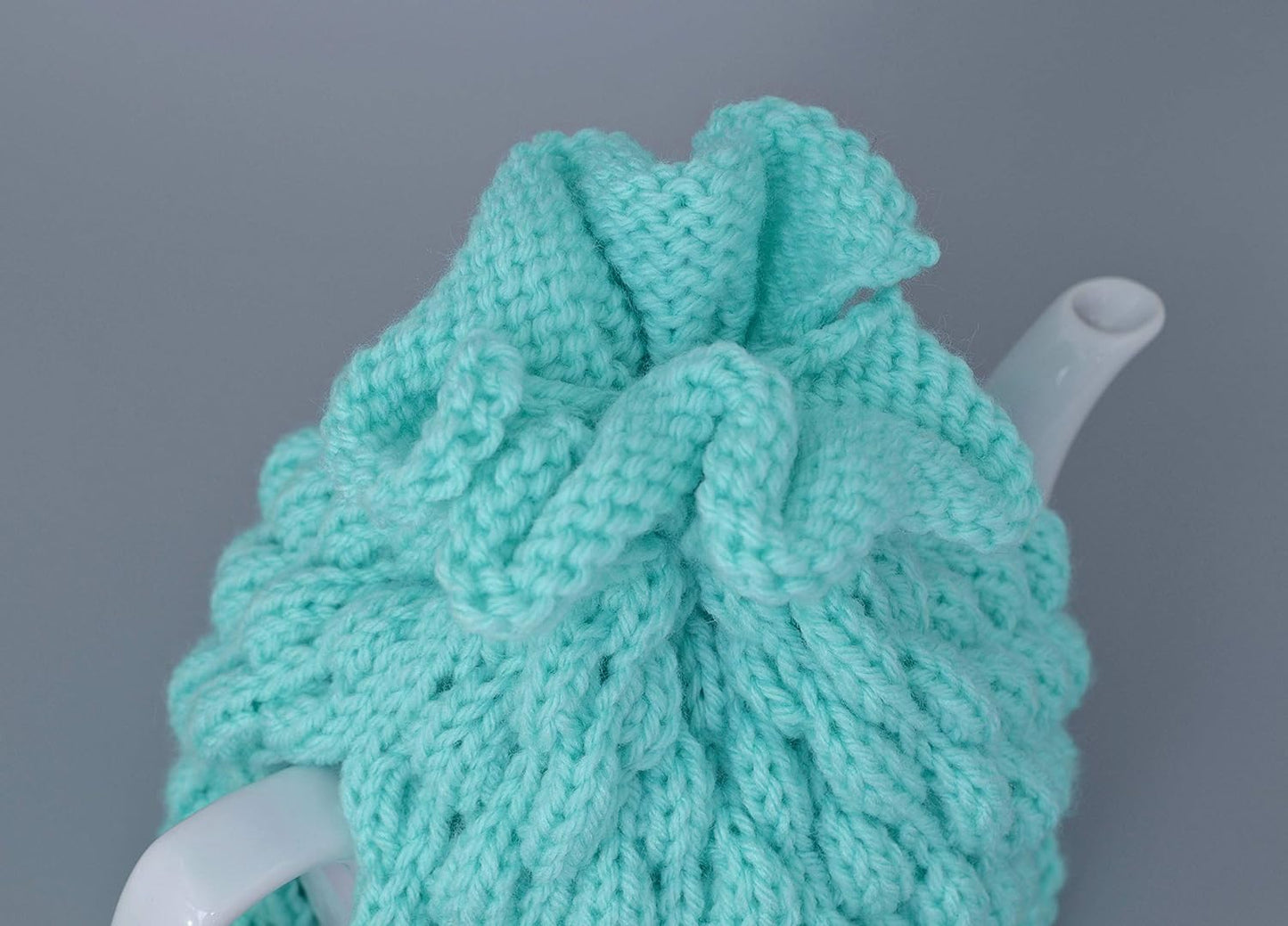 Aqua knitted teapot cozy