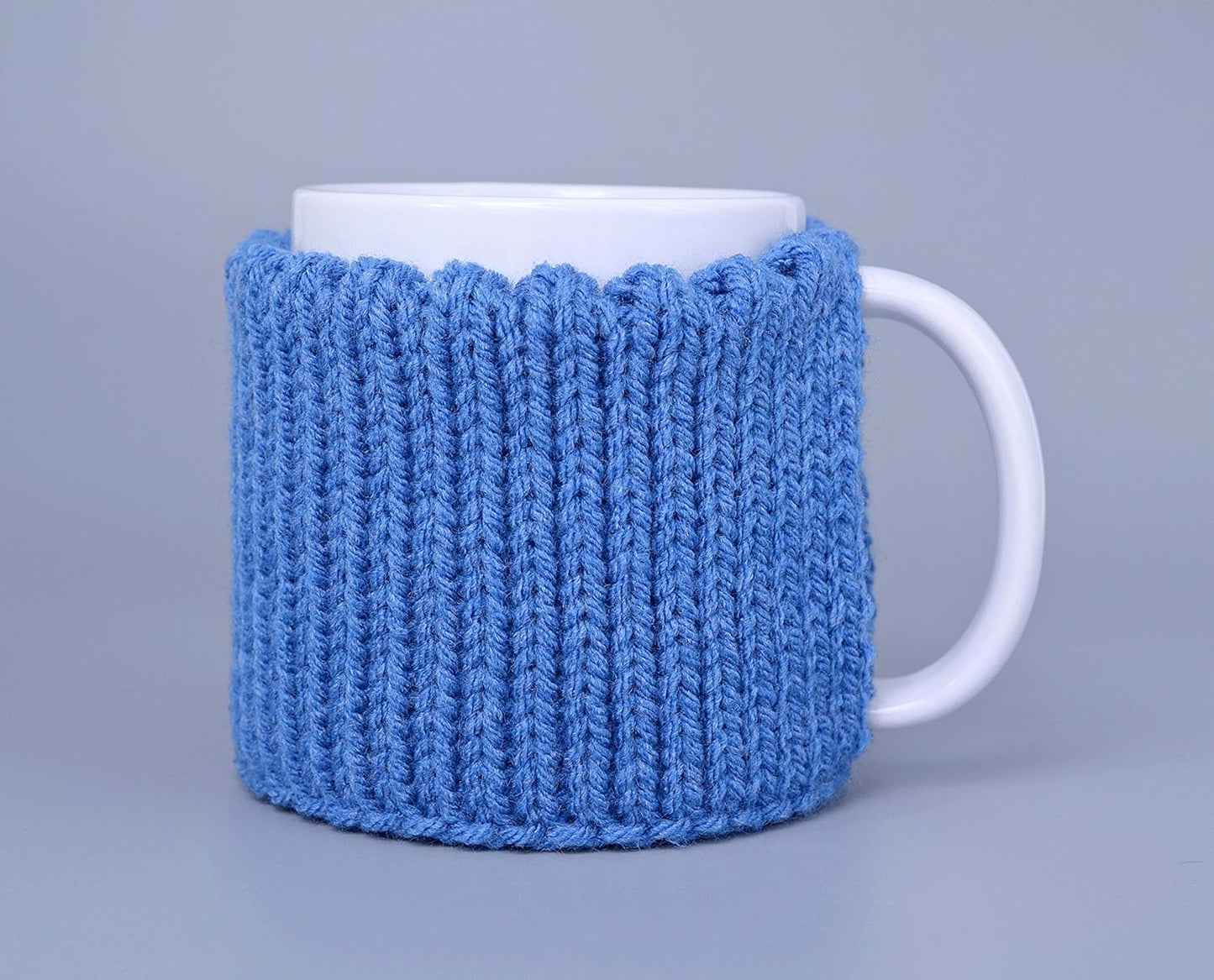 Blue knitted mug cozy