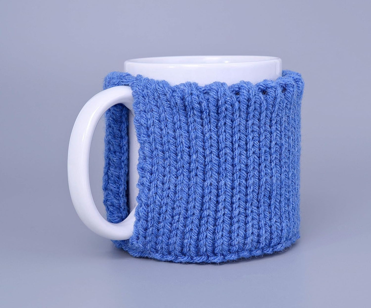 Blue knitted mug cozy