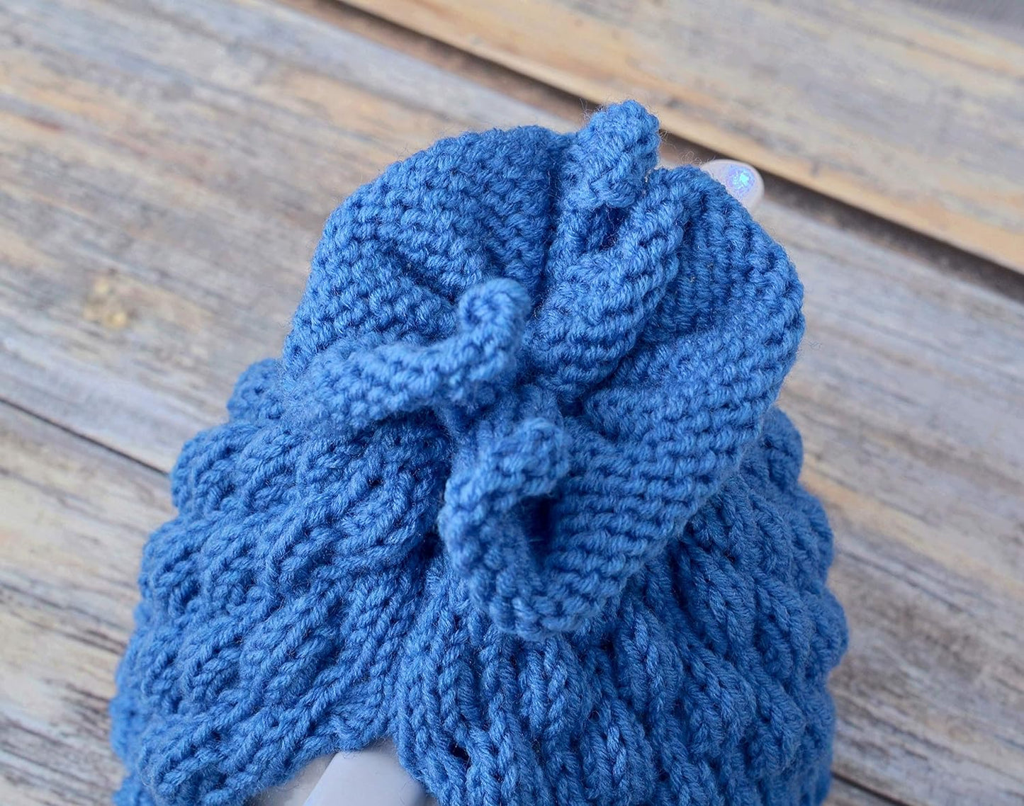 Blue knitted teapot cozy