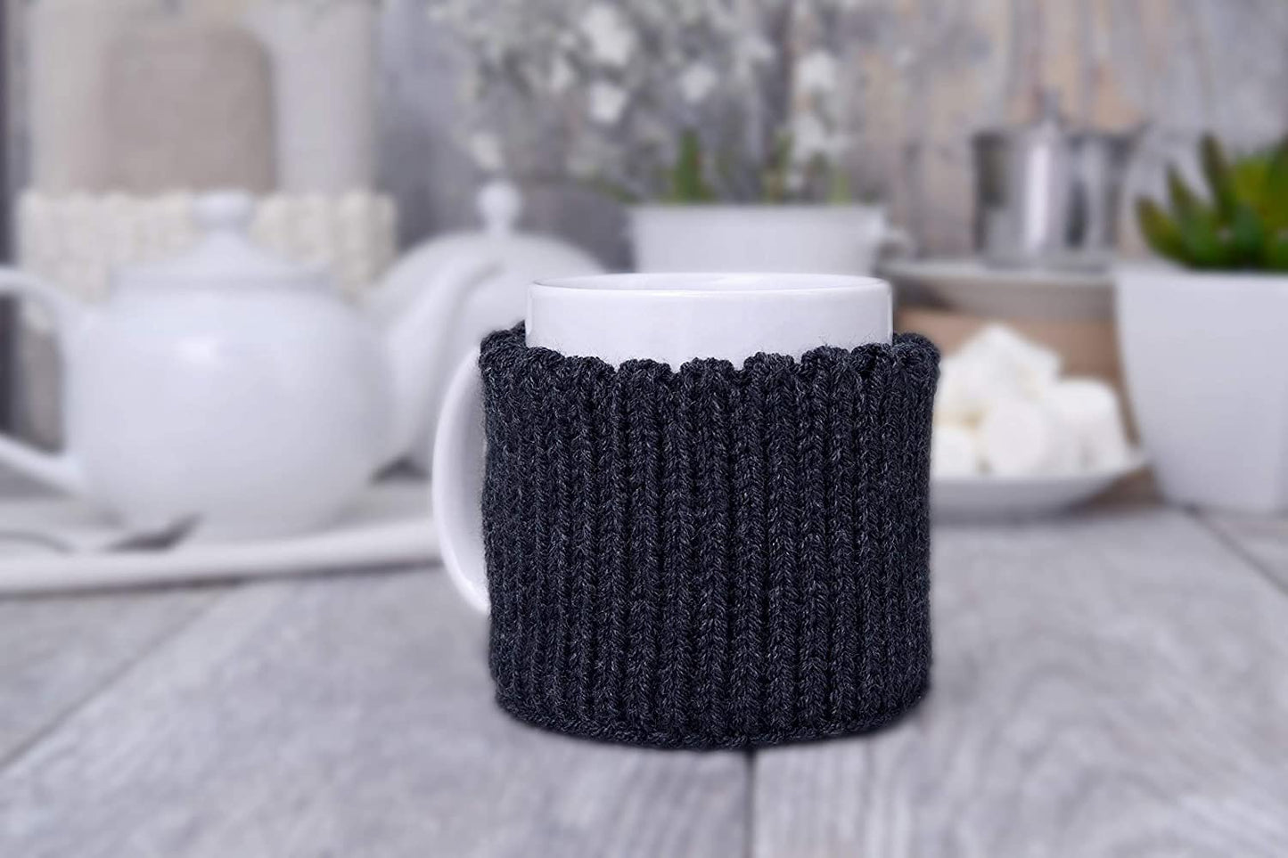 Dark gray knitted mug cozy