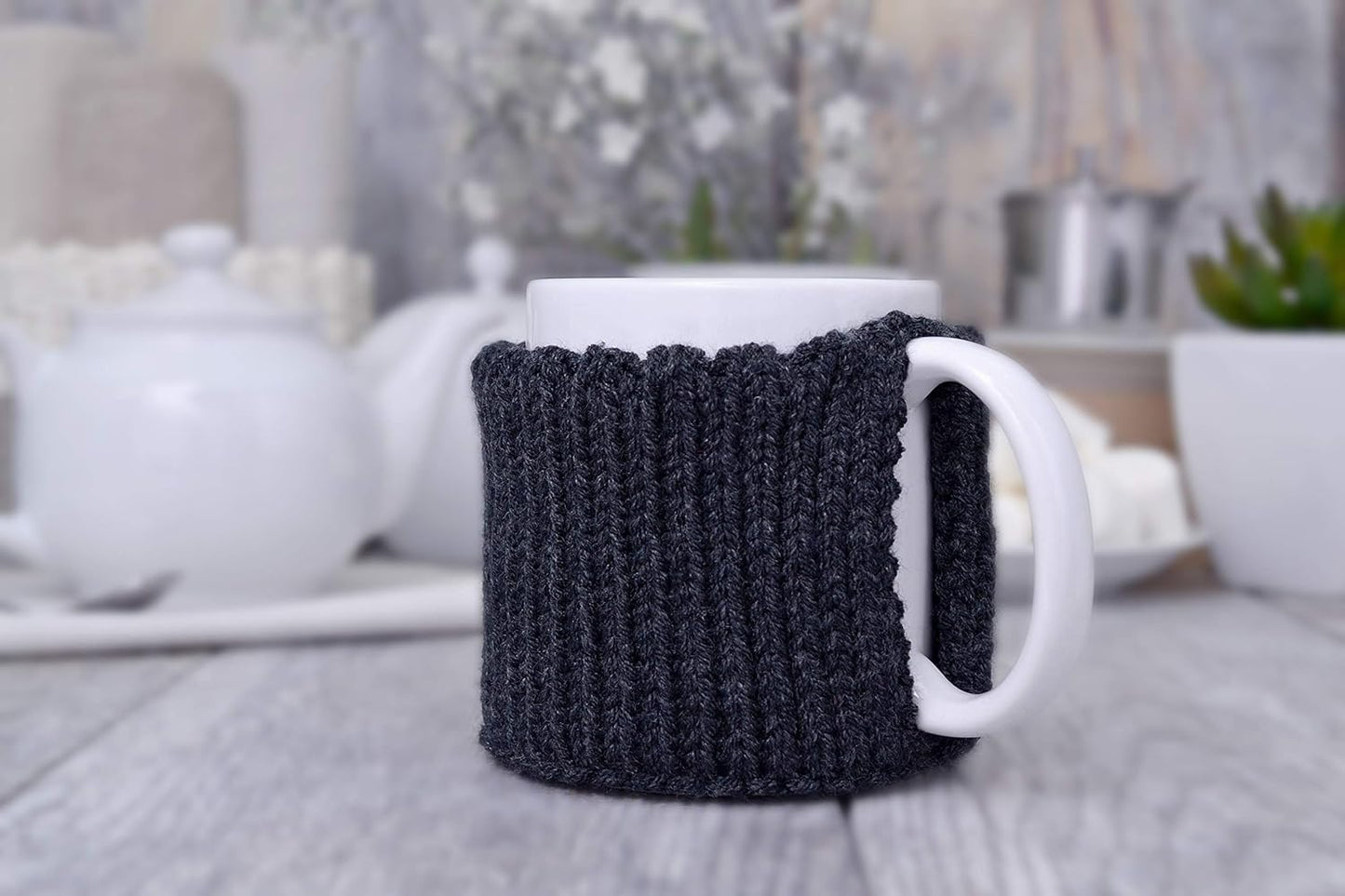 Dark gray knitted mug cozy