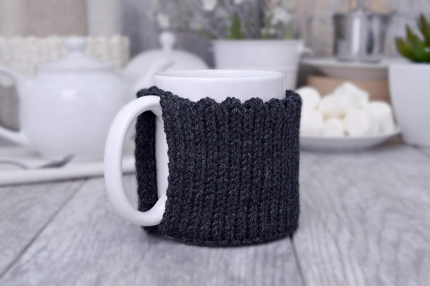 Dark gray knitted mug cozy