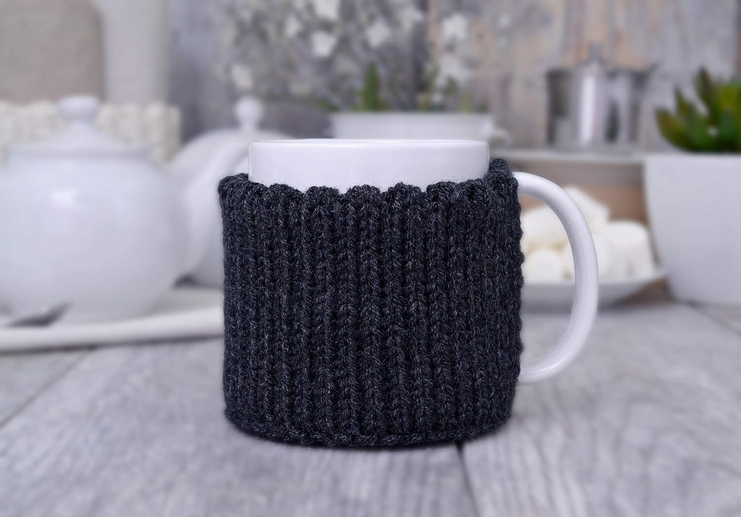 Dark gray knitted mug cozy