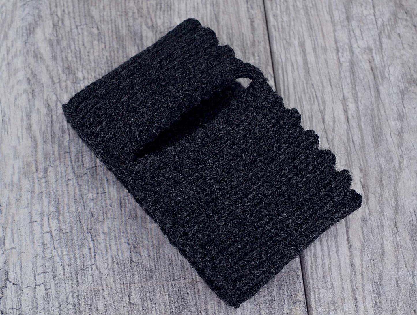 Dark gray knitted mug cozy