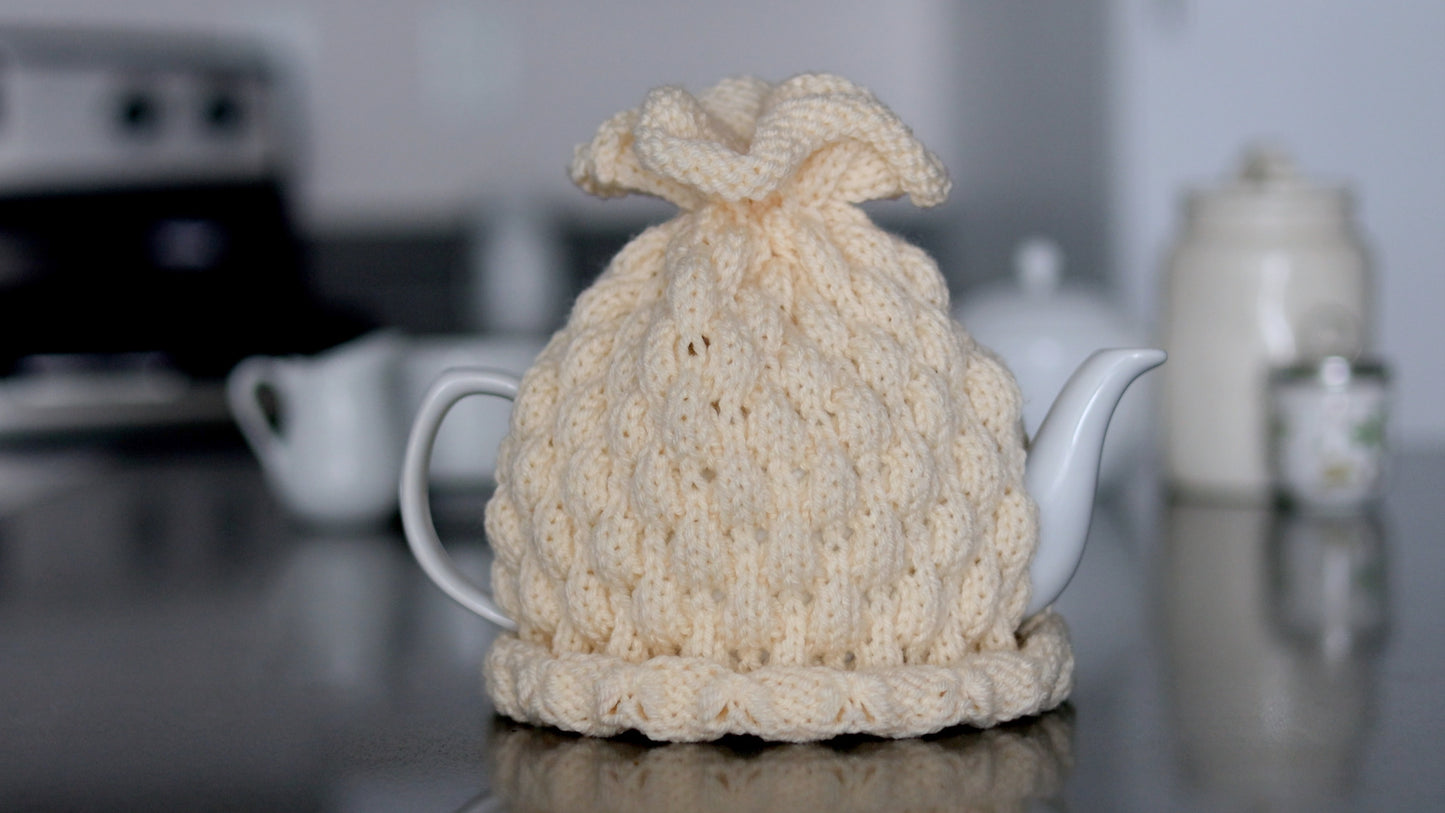 Ivory knitted teapot cozy