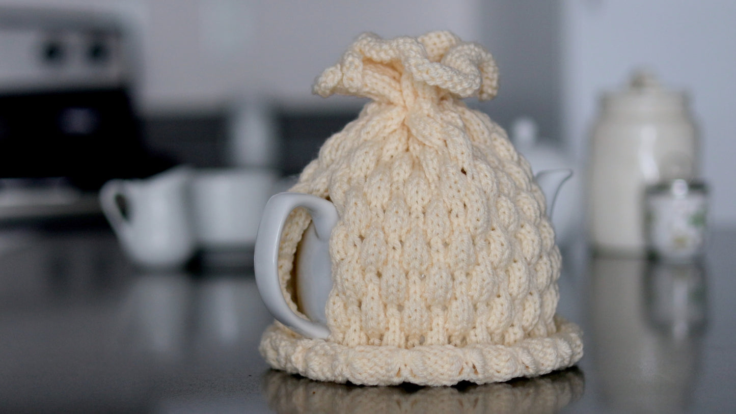 Ivory knitted teapot cozy