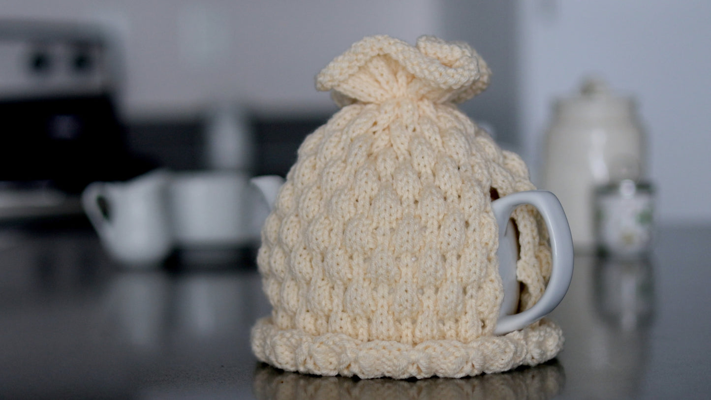 Ivory knitted teapot cozy