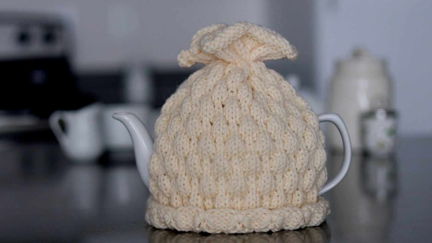 Ivory knitted teapot cozy