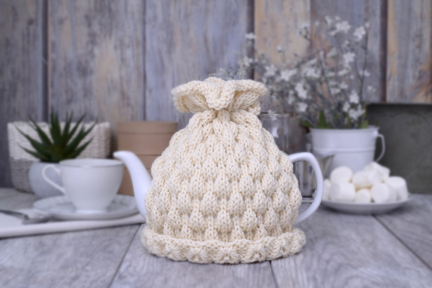 Ivory knitted teapot cozy