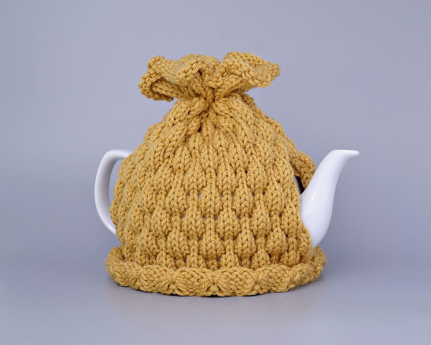 Mustard knitted teapot cozy