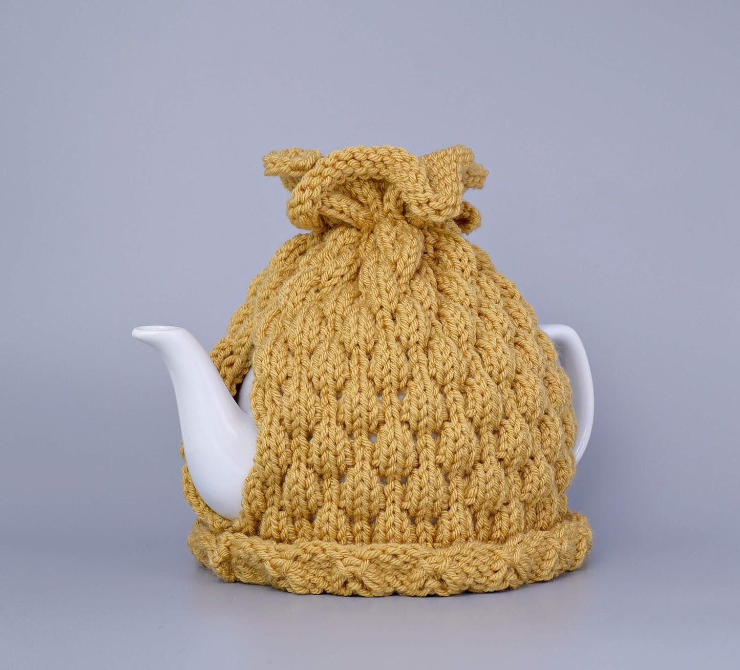 Mustard knitted teapot cozy