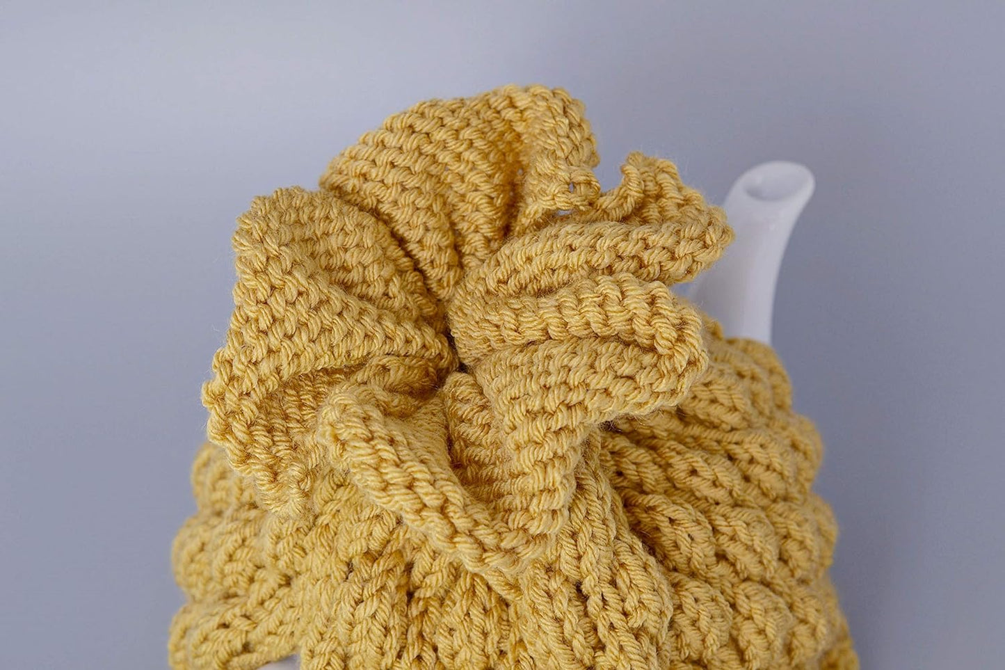 Mustard knitted teapot cozy