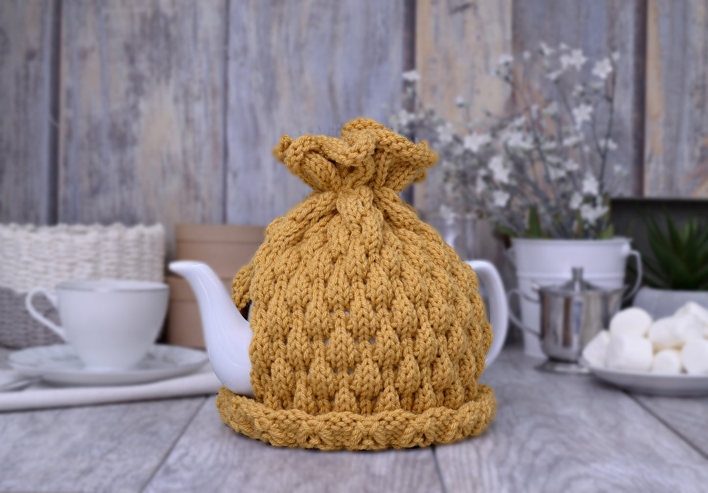 Mustard knitted teapot cozy