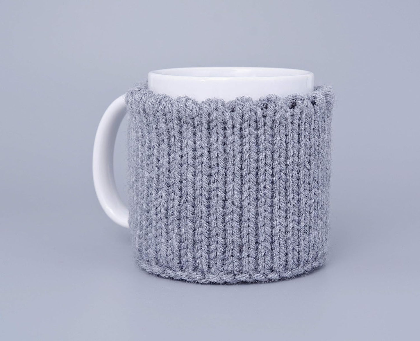 Gray knitted mug cozy