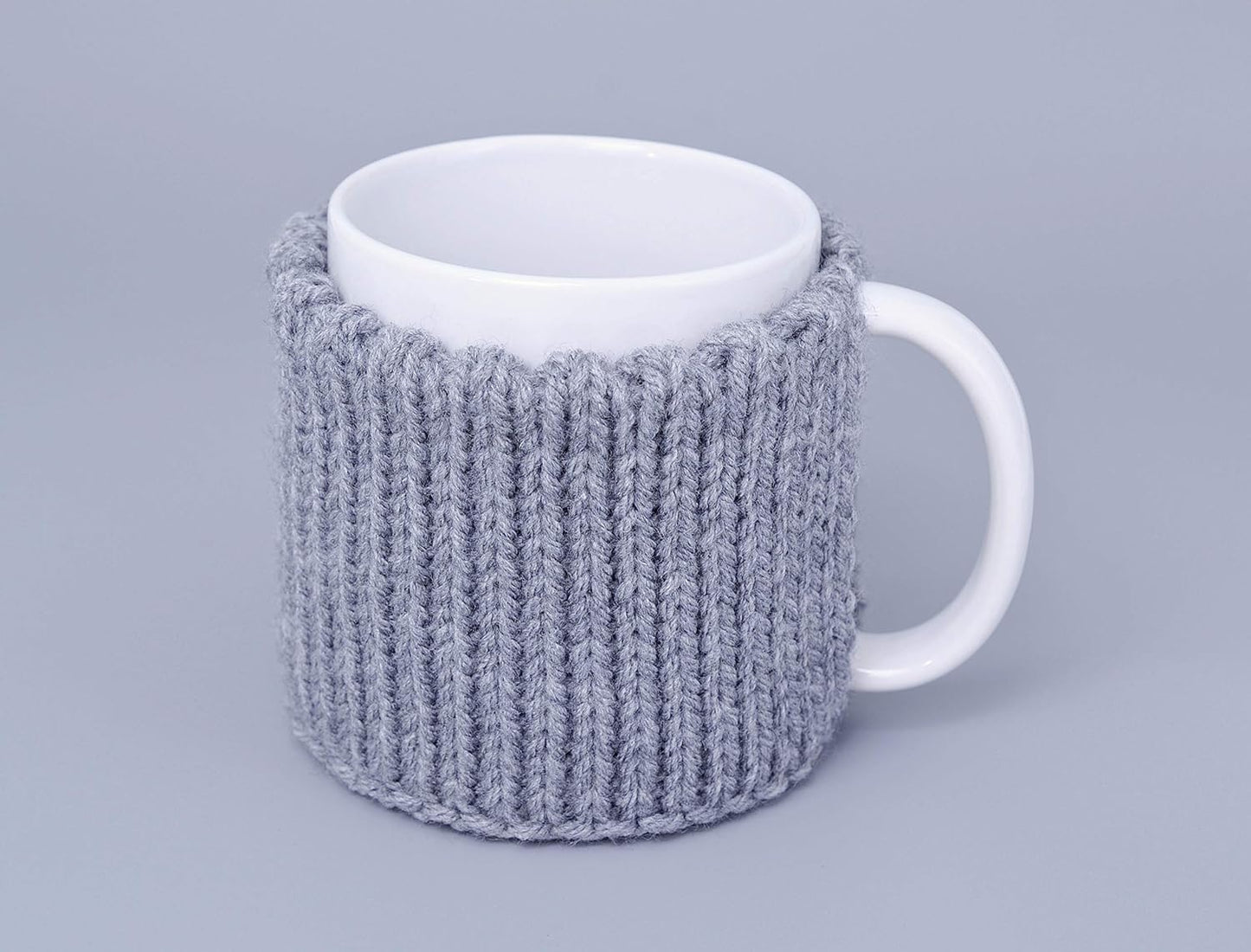 Gray knitted mug cozy