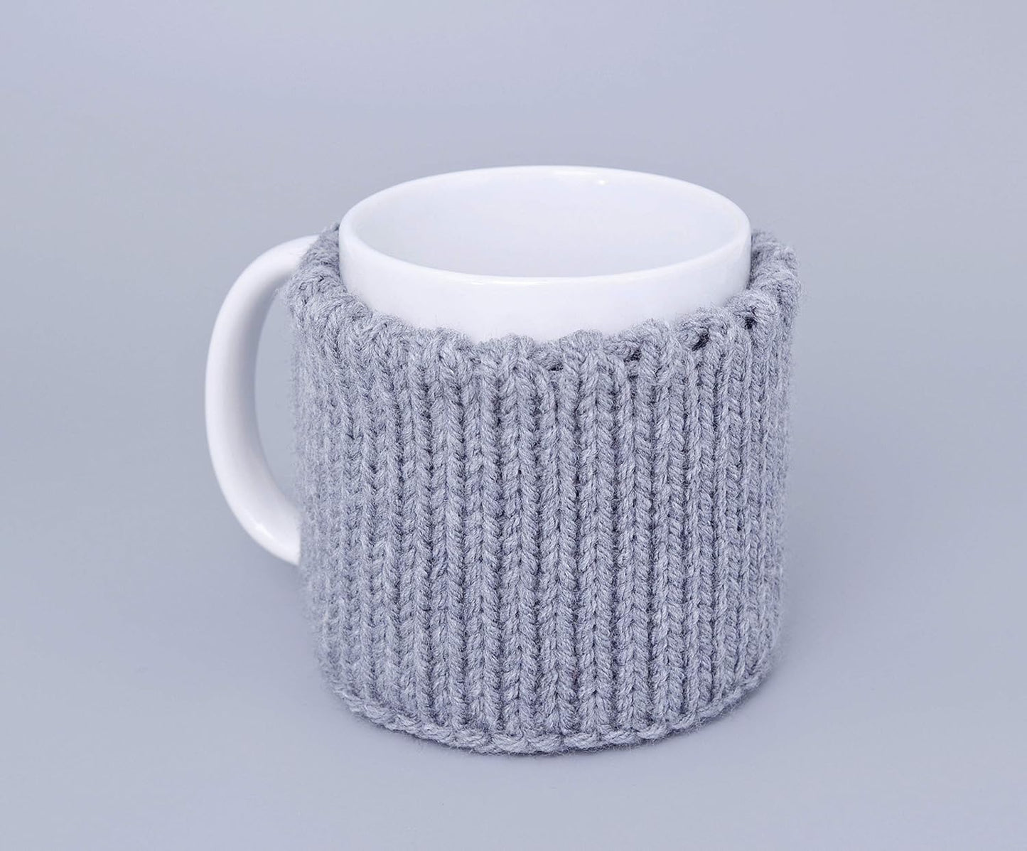 Gray knitted mug cozy