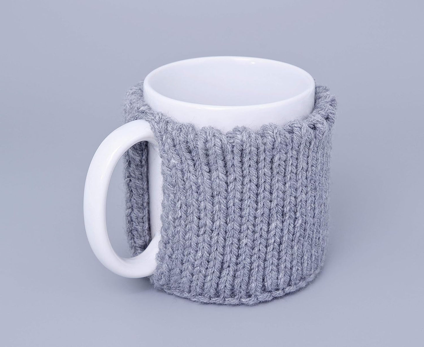 Gray knitted mug cozy