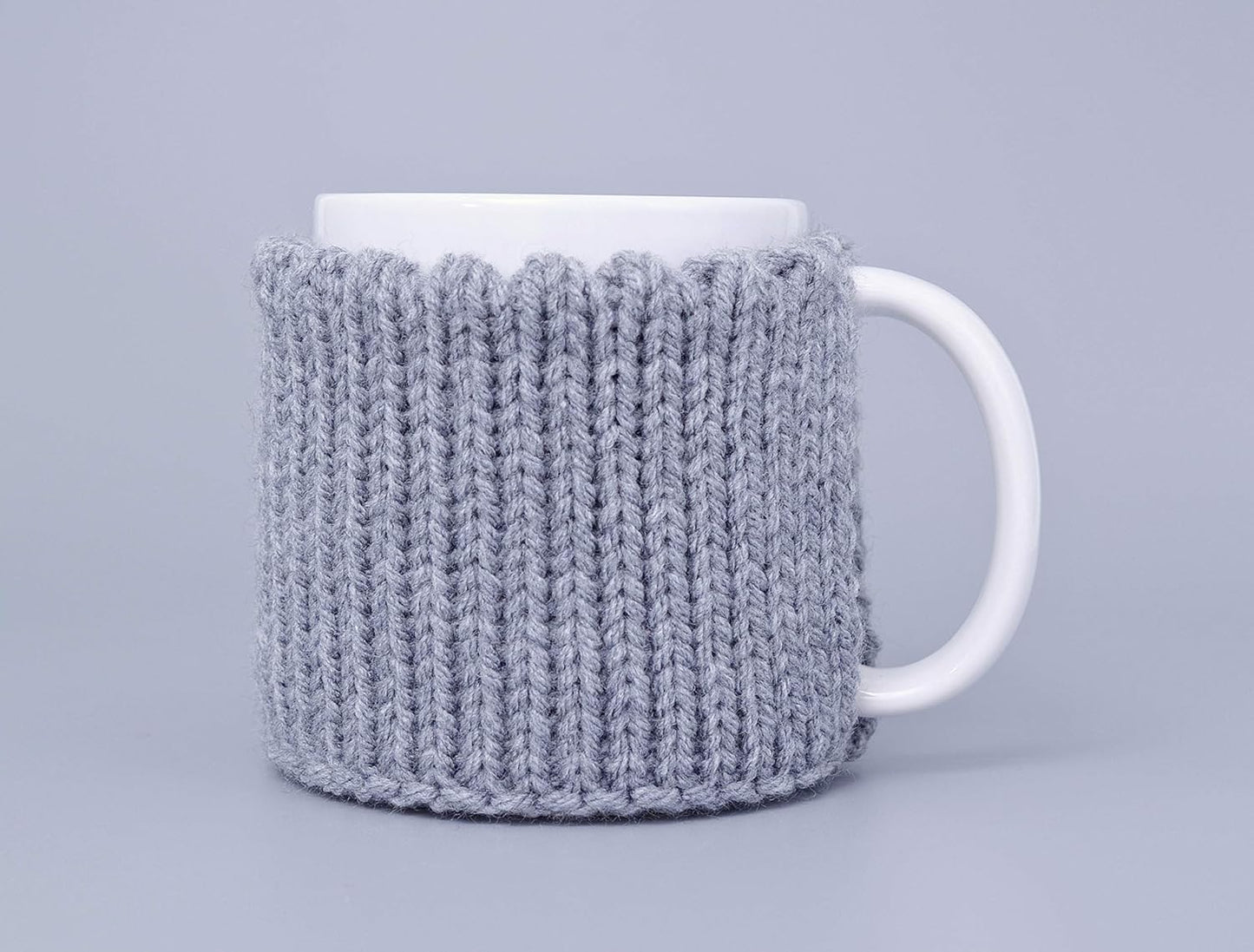 Gray knitted mug cozy