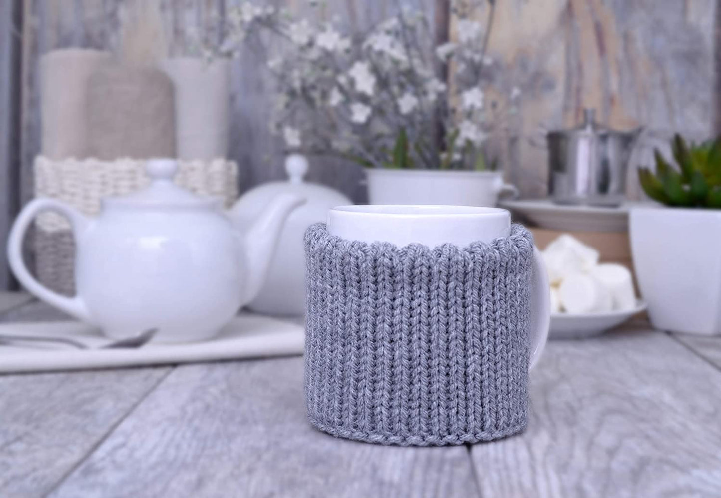 Gray knitted mug cozy