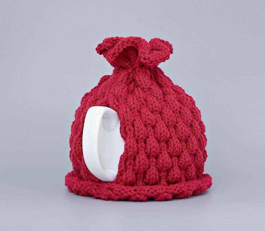 Red knitted teapot cozy