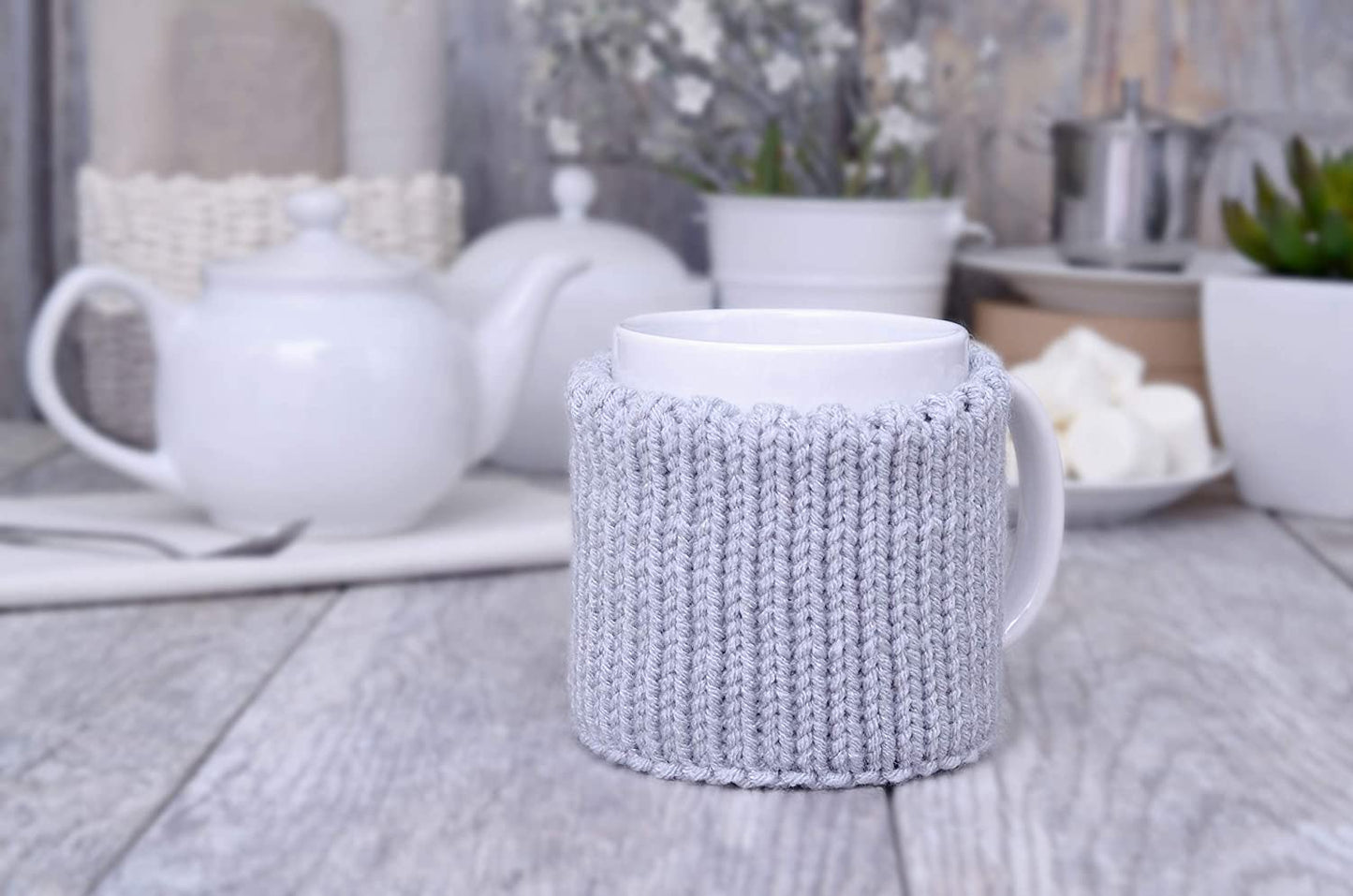 Silver gray knitted mug cozy